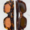 Acetat-Sonnenbrille mit rechteckigem Rahmen Acetat-Sonnenbrille mit rechteckigem Rahmen