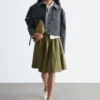 Ausgestellter knielanger Rock Ausgestellter knielanger Rock