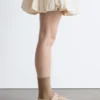 Ballerinas aus Wildleder mit gekreuzten Riemen