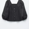 Baumwoll-Bluse mit quadratischem Ausschnitt Baumwoll-Bluse mit quadratischem Ausschnitt