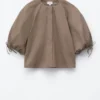 Baumwoll-Bluse mit voluminösen Ärmeln Baumwoll-Bluse mit voluminösen Ärmeln