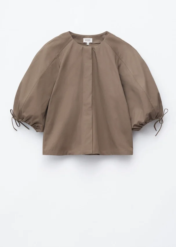 Baumwoll-Bluse mit voluminösen Ärmeln Baumwoll-Bluse mit voluminösen Ärmeln