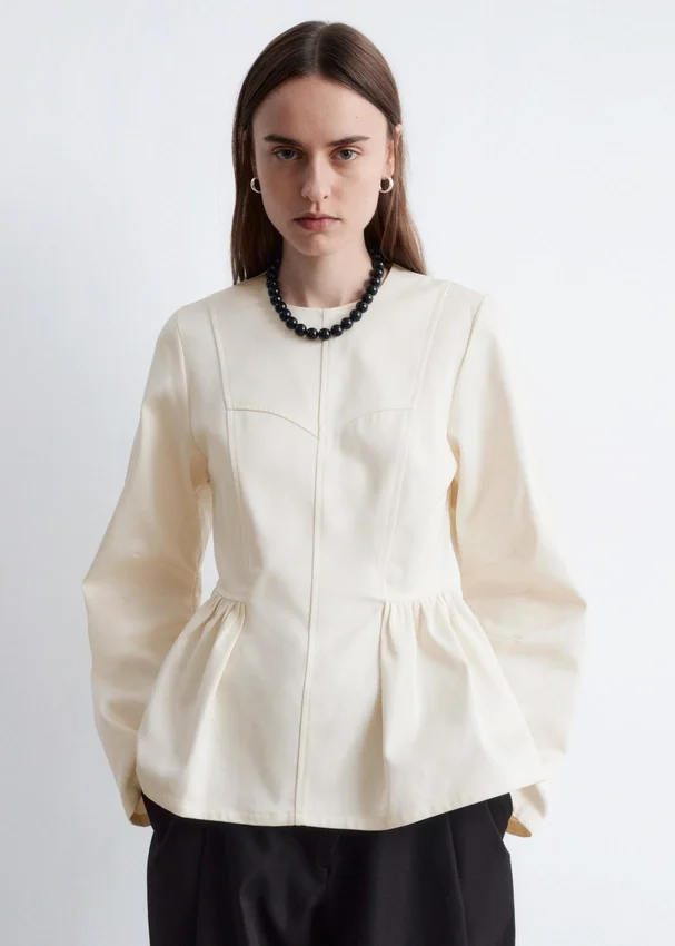 Baumwoll-Peplum-Oberteil Baumwoll-Peplum-Oberteil