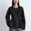 Baumwoll-Peplum-Oberteil Baumwoll-Peplum-Oberteil