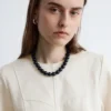Baumwoll-Peplum-Oberteil Baumwoll-Peplum-Oberteil