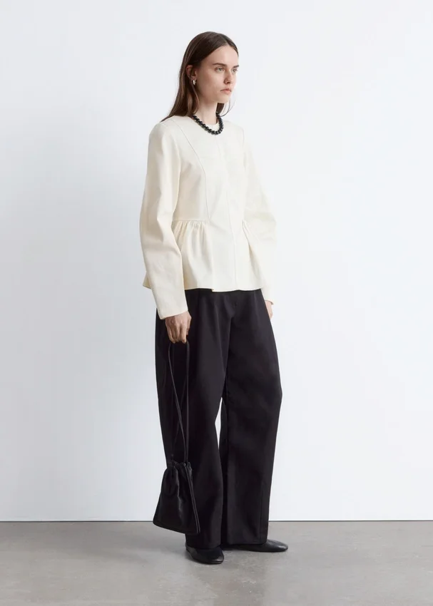 Baumwoll-Peplum-Oberteil Baumwoll-Peplum-Oberteil