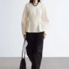 Baumwoll-Peplum-Oberteil Baumwoll-Peplum-Oberteil