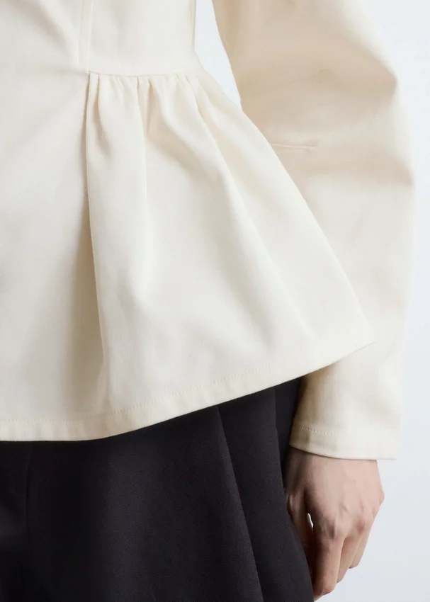 Baumwoll-Peplum-Oberteil Baumwoll-Peplum-Oberteil