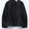 Baumwoll-Peplum-Oberteil Baumwoll-Peplum-Oberteil