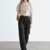 Bedruckte Seiden-Bluse mit Krawattenkragen Bedruckte Seiden-Bluse mit Krawattenkragen