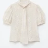 Bedruckte Seiden-Bluse mit Krawattenkragen Bedruckte Seiden-Bluse mit Krawattenkragen
