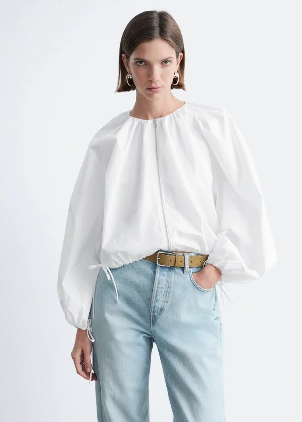 Bluse aus Baumwollpopeline mit Reißverschluss vorne Bluse aus Baumwollpopeline mit Reißverschluss vorne