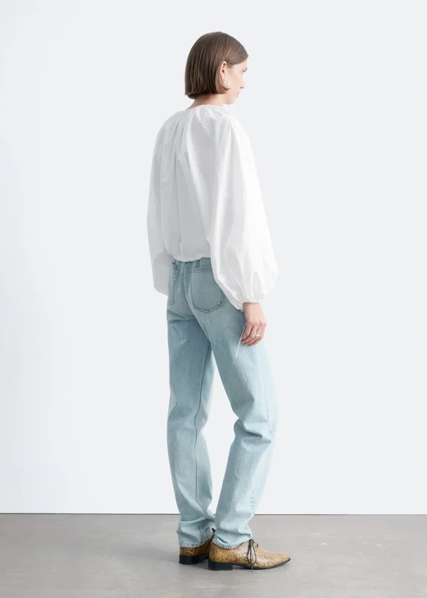 Bluse aus Baumwollpopeline mit Reißverschluss vorne Bluse aus Baumwollpopeline mit Reißverschluss vorne