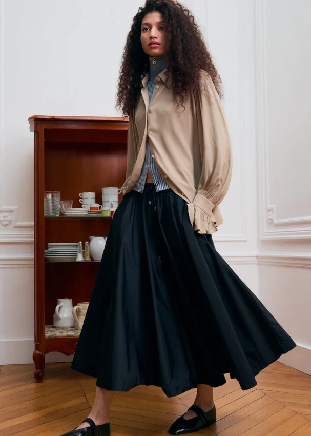 Bluse mit gerafftem Rücken Bluse mit gerafftem Rücken