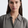 Bluse mit gerafftem Rücken und Bindeband Bluse mit gerafftem Rücken und Bindeband