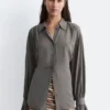 Bluse mit gerafftem Rücken und Bindeband Bluse mit gerafftem Rücken und Bindeband