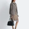 Bluse mit gerafftem Rücken und Bindeband Bluse mit gerafftem Rücken und Bindeband