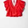 Bluse mit Rüschen und V-Ausschnitt Bluse mit Rüschen und V-Ausschnitt