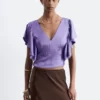 Bluse mit Rüschen und V-Ausschnitt Bluse mit Rüschen und V-Ausschnitt