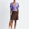 Bluse mit Rüschen und V-Ausschnitt Bluse mit Rüschen und V-Ausschnitt