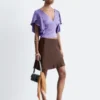 Bluse mit Rüschen und V-Ausschnitt Bluse mit Rüschen und V-Ausschnitt