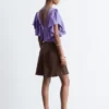 Bluse mit Rüschen und V-Ausschnitt Bluse mit Rüschen und V-Ausschnitt