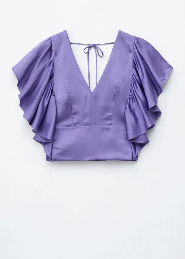 Bluse mit Rüschen und V-Ausschnitt Bluse mit Rüschen und V-Ausschnitt