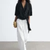 Bluse mit Wickelausschnitt Bluse mit Wickelausschnitt