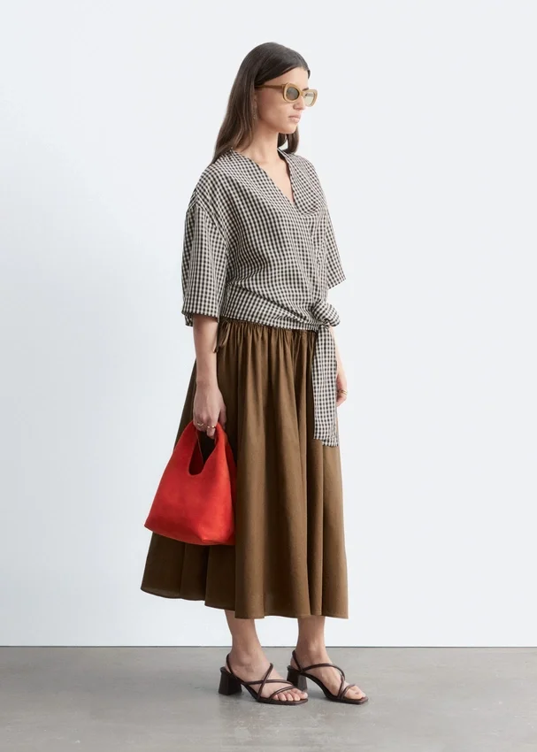 Bluse mit Wickelausschnitt Bluse mit Wickelausschnitt