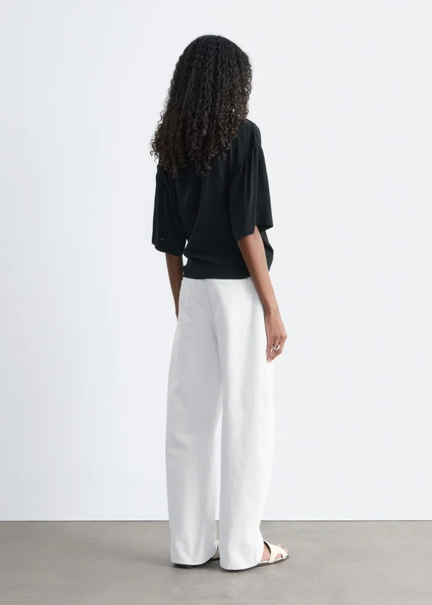 Bluse mit Wickelausschnitt Bluse mit Wickelausschnitt