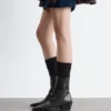 Elegante Cowboy-Stiefel aus Leder Elegante Cowboy-Stiefel aus Leder