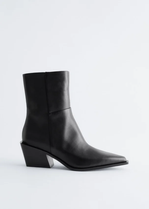 Elegante Cowboy-Stiefel aus Leder Elegante Cowboy-Stiefel aus Leder