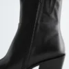 Elegante Cowboy-Stiefel aus Leder Elegante Cowboy-Stiefel aus Leder