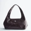 Geschwungene Leder-Schultertasche