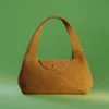 Geschwungene Schultertasche Geschwungene Schultertasche