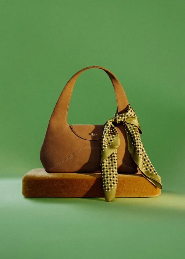 Geschwungene Schultertasche Geschwungene Schultertasche
