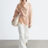 Gestreifte Bluse mit Wasserfallausschnitt Gestreifte Bluse mit Wasserfallausschnitt
