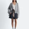 Gestrickter Cardigan aus gebürsteter Mohair-Mischung Gestrickter Cardigan aus gebürsteter Mohair-Mischung