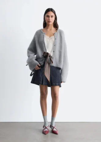 Gestrickter Cardigan aus gebürsteter Mohair-Mischung Gestrickter Cardigan aus gebürsteter Mohair-Mischung
