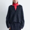 Gestrickter Cardigan aus gebürsteter Mohair-Mischung Gestrickter Cardigan aus gebürsteter Mohair-Mischung