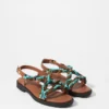 Ledersandalen mit Perlenverzierung