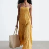 Maxikleid mit plissiertem Oberteil Maxikleid mit plissiertem Oberteil