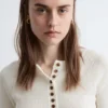 Merino-Wolloberteil mit halber Knopfleiste Merino-Wolloberteil mit halber Knopfleiste