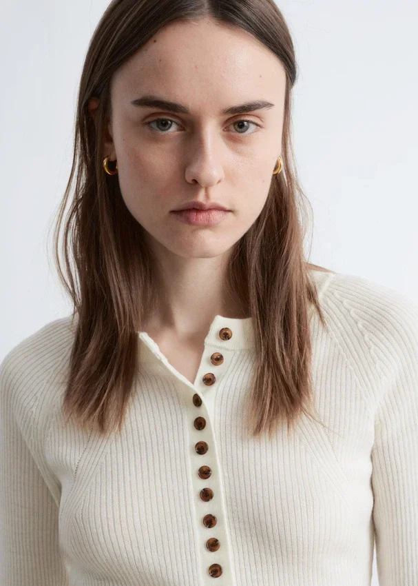 Merino-Wolloberteil mit halber Knopfleiste Merino-Wolloberteil mit halber Knopfleiste