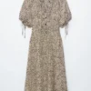 Midikleid mit Bindegürtel