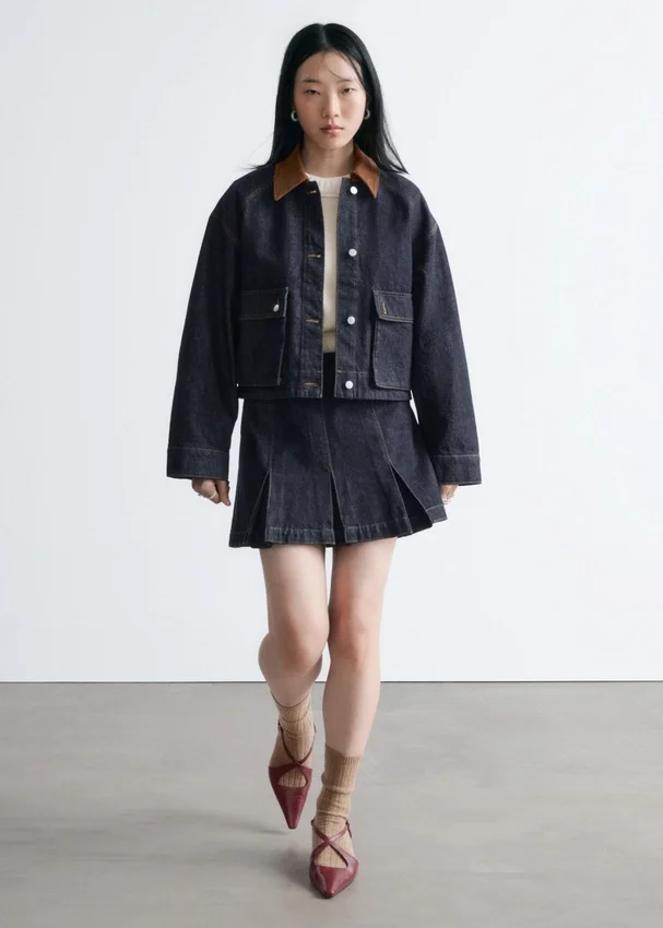 Plissierter Denim-Minirock Plissierter Denim-Minirock