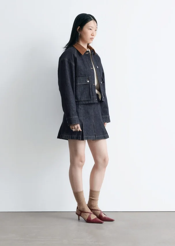 Plissierter Denim-Minirock Plissierter Denim-Minirock