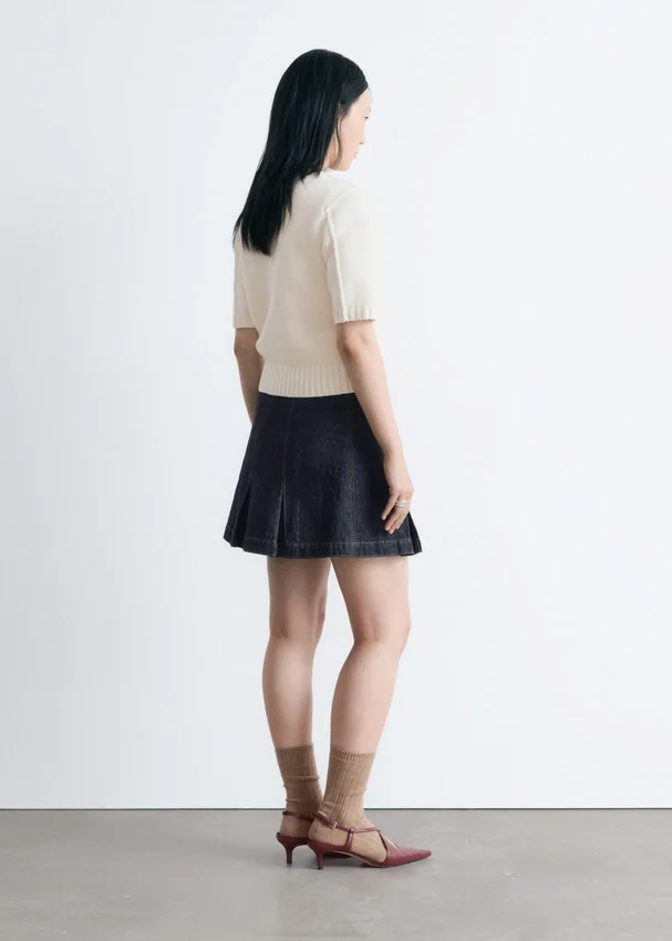 Plissierter Denim-Minirock Plissierter Denim-Minirock