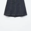 Plissierter Denim-Minirock Plissierter Denim-Minirock