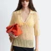 Polo-Shirt aus offenem Strick Polo-Shirt aus offenem Strick
